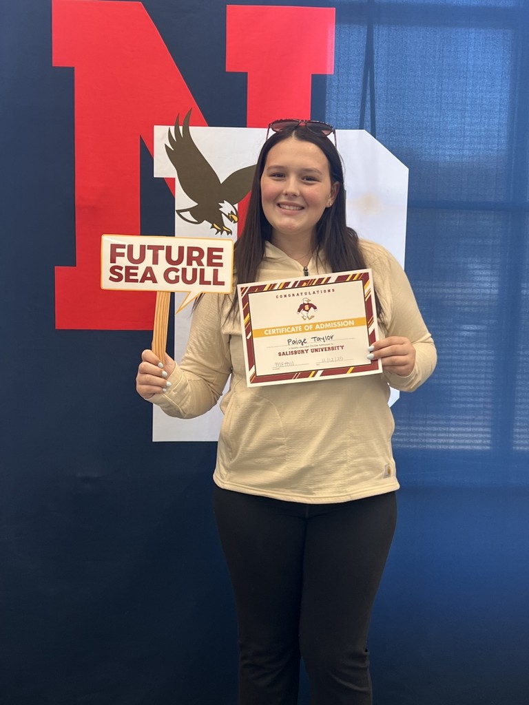 student holding a certificate