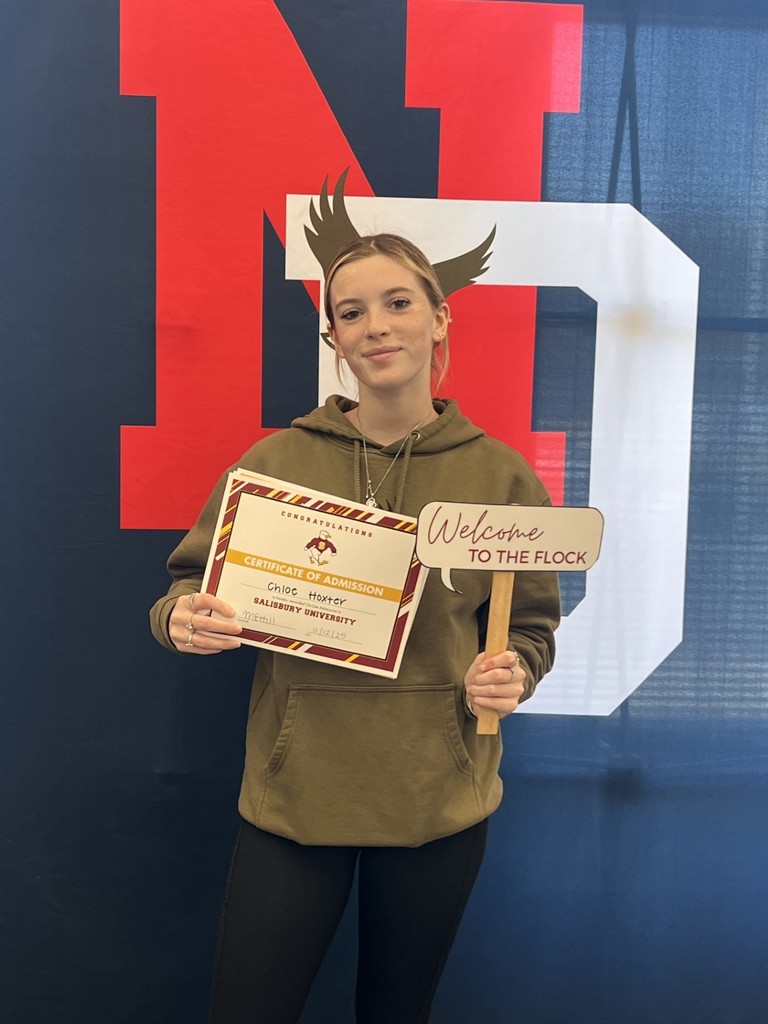 student holding a certificate