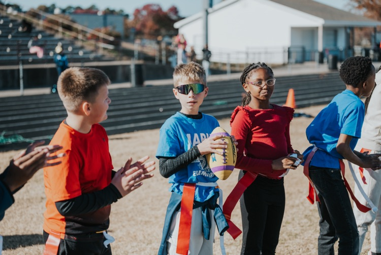 MES 7v7 football house rally at Viking Stadium