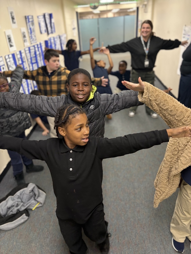 Kids with their arms spread wide