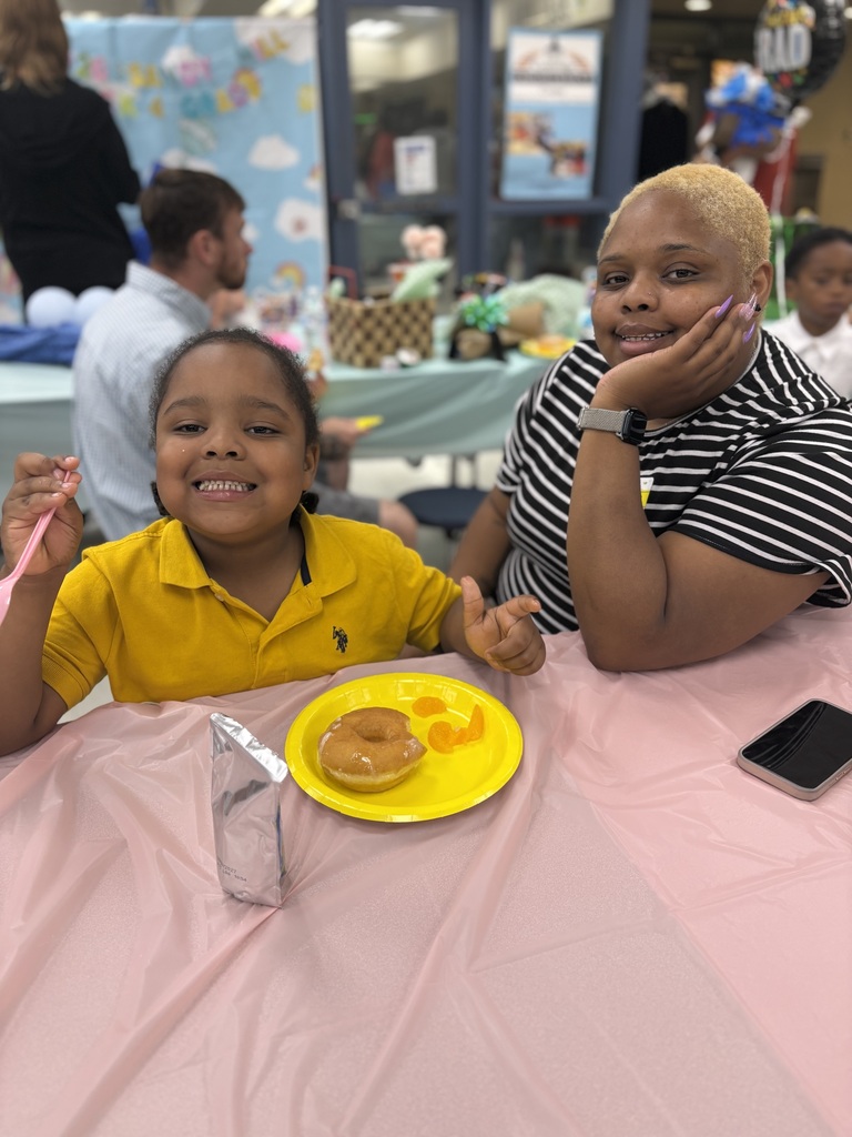 Parent eating with student