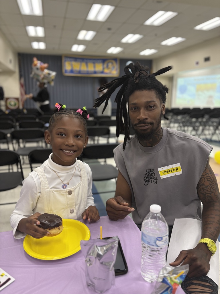 Student and parent Eating at graduation
