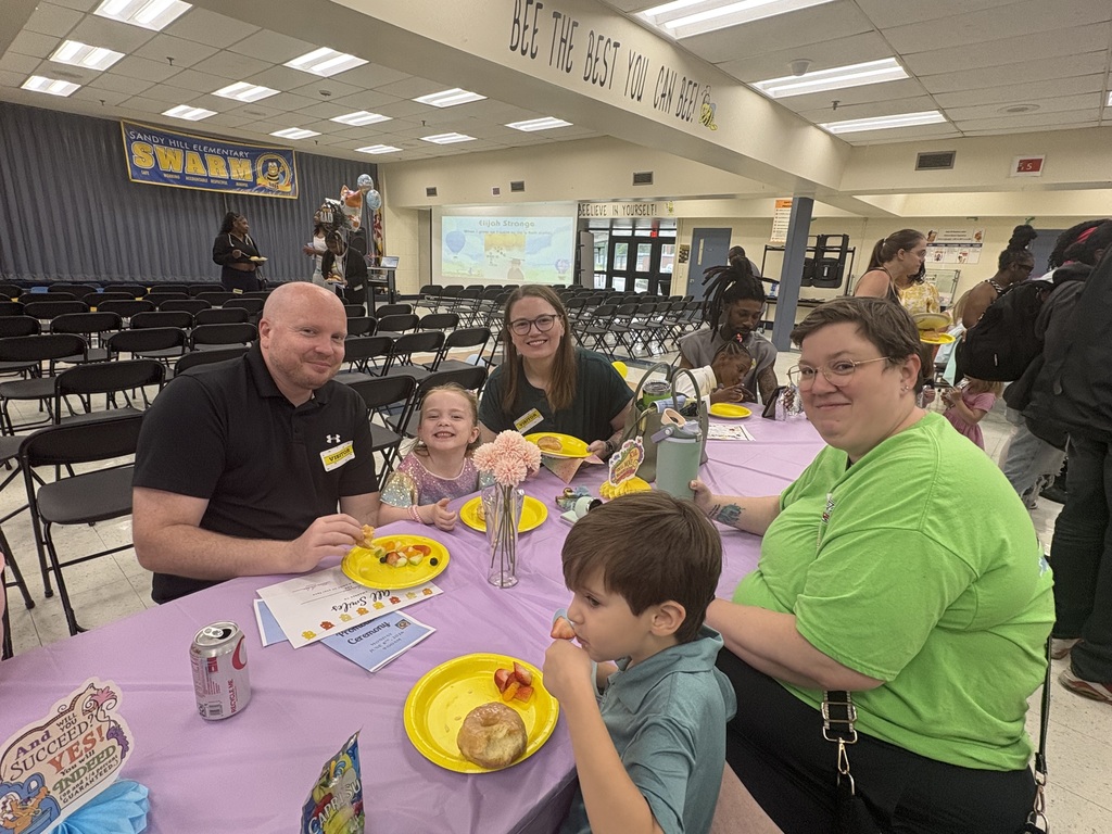 Parents and students eating at the table