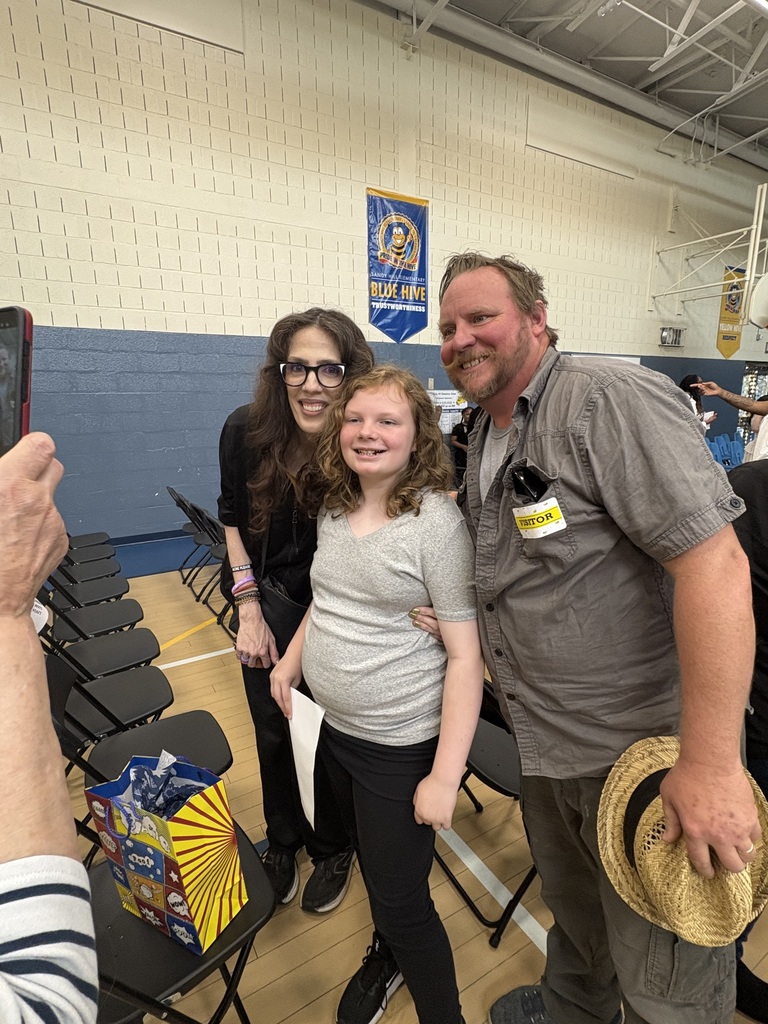 5th grade graduate and family
