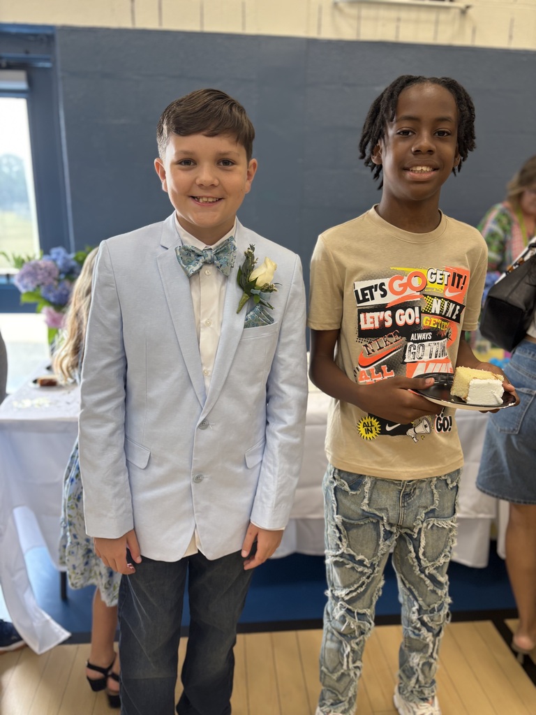 2 fifth grade graduates