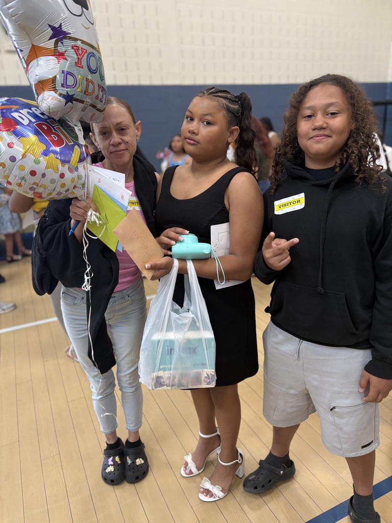 5th grade graduate and family