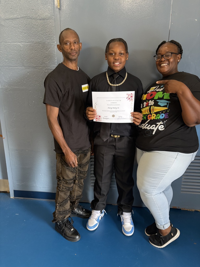 5th grade graduate and family