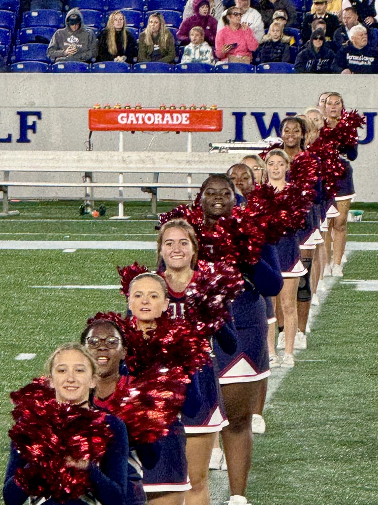 Cheer team performing on the field