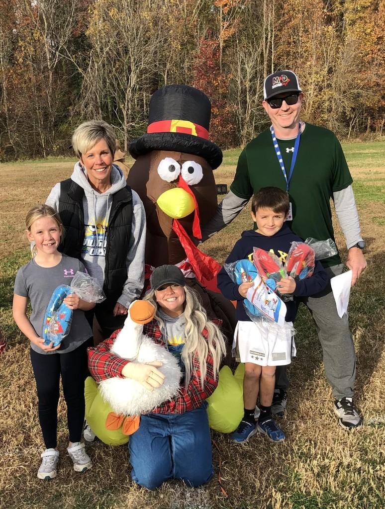Principal Blake, PE teacher Mr. Dargan, Wild Goose with friend Miss Stephanie, and winners Brooks and Aubrie