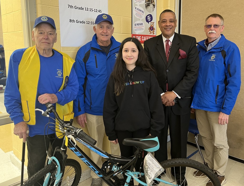 Bike winner with Lions and principal