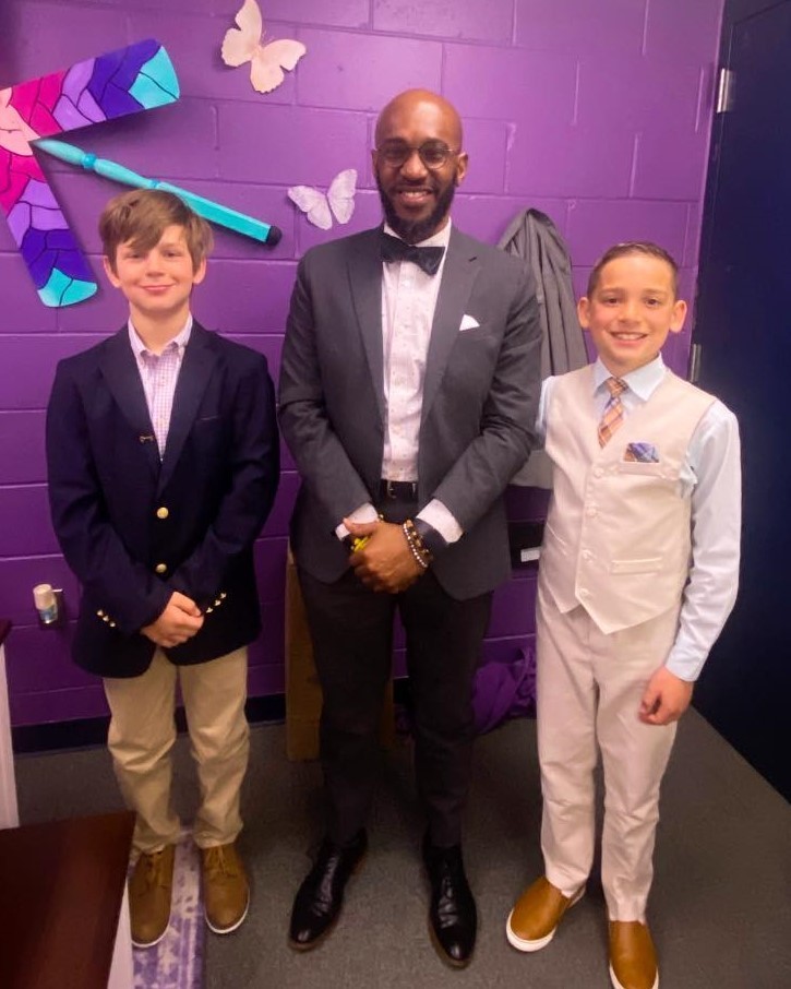 A man and two boys