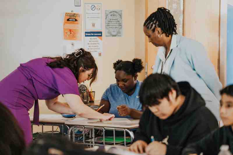 state dept. representatives assisting students