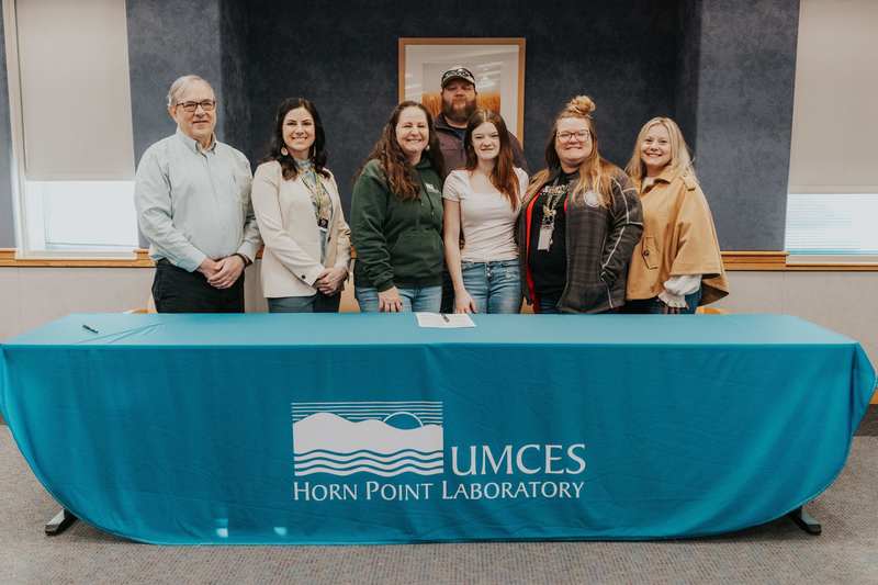 Evelyn standing with people from Horn Point and DCTC