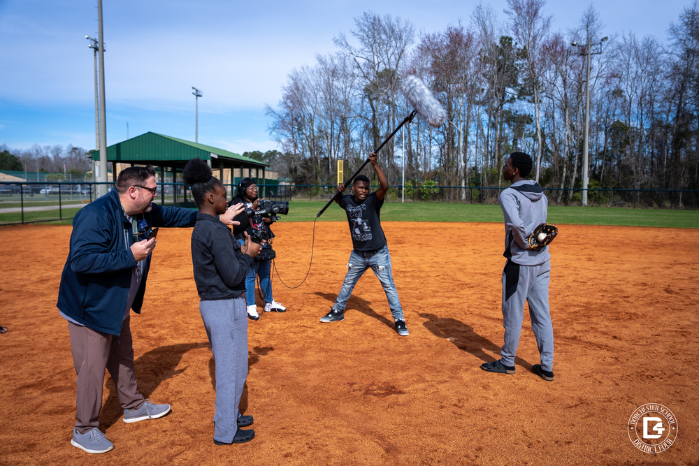 🎬🎤 Lights, Camera, Action at Woodland High! 🎤🎬 Mr. Coley’s Media Tech class took a hands-on approach to filmmaking as they learned how to sync wireless audio with recorded footage! 🎥✨ Students operated a cinema camera, boom mic, and wireless audio equipment while others stepped into the spotlight, acting out scenes from the classic movie The Sandlot! ⚾🎞️ With Mr. Coley coaching behind the lens, students learned how to frame the perfect shot, direct actors, and bring scenes to life. To ensure authenticity, he even pulled up the original clip, guiding students on body posture, dialogue delivery, and acting techniques. 👏🎭 Woodland High’s CTE program is equipping students with real-world media production skills, preparing them for careers in film, broadcasting, and beyond! 🚀💡 #WHSwolverines #CTE #FutureFilmmakers #MediaTech #TheSandlot 🎬