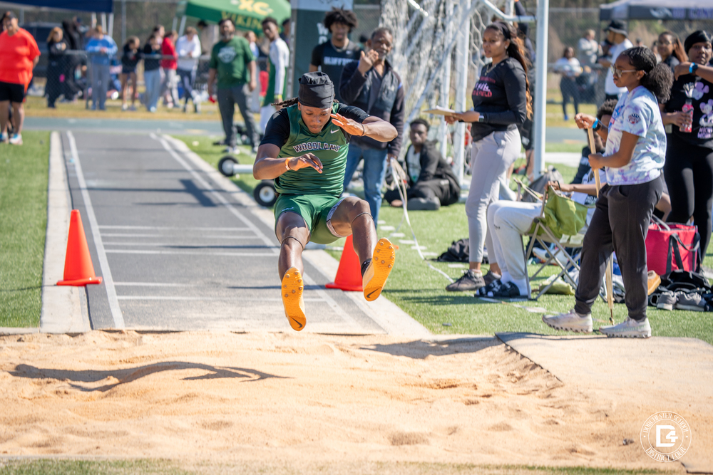 Student jumping in long jump