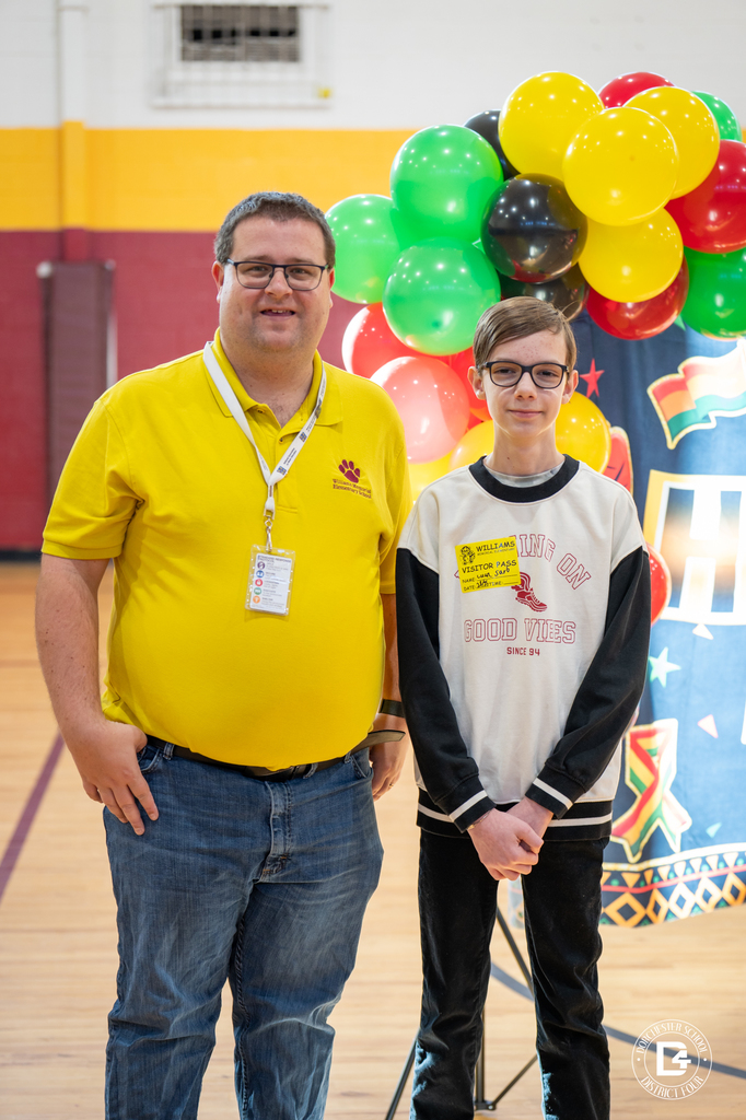 Luca and Mr. Phillips posing for photo