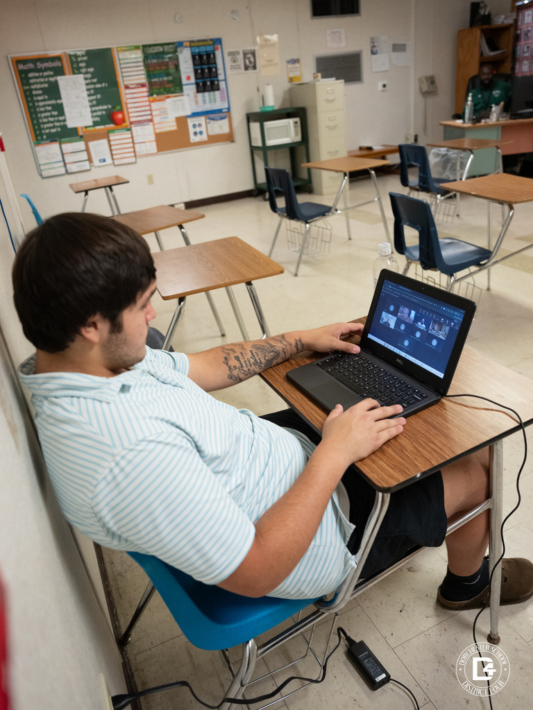 High school student at Odyssey Educational Center uses a laptop to participate in The Odyssey Experience virtual career fair.