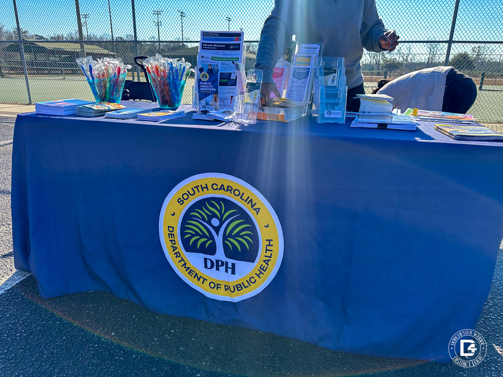 A South Carolina Department of Public Health table provides health information, brochures, and giveaways during the event.