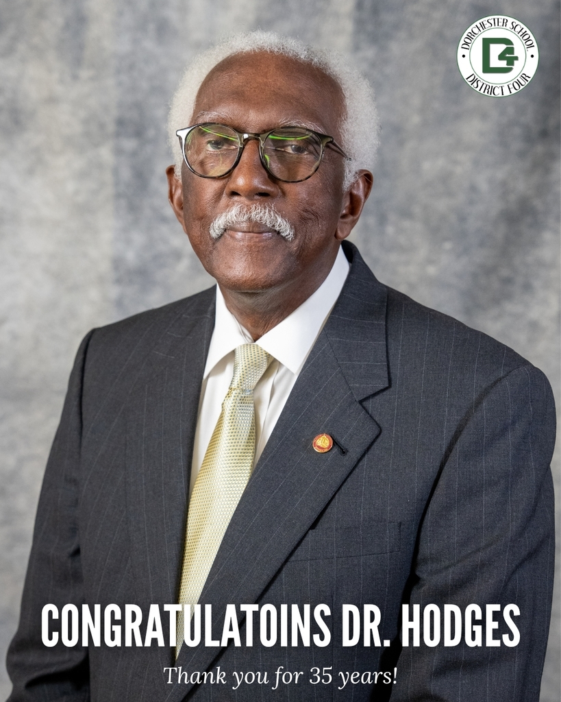 Formal portrait of Dr. Hodges wearing a dark suit, white shirt, and light gold tie, standing against a gray backdrop, with the Dorchester School District Four logo in the upper right corner and text reading “Congratulations Dr. Hodges” and “Thank you for 35 years.”