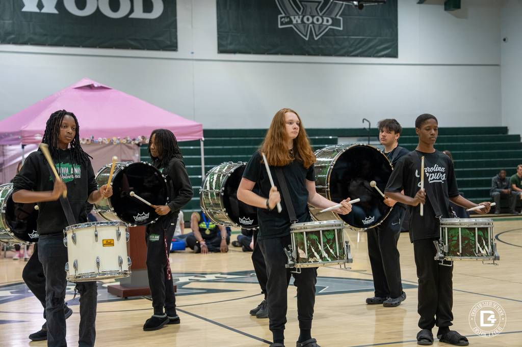 Woodland High School drumline students perform on the gymnasium floor for visiting 8th grade students during Preview Day.