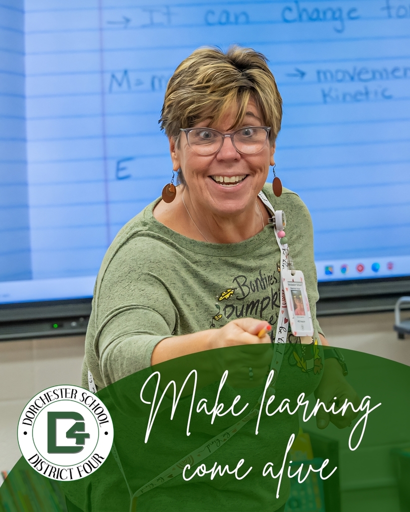 A DD4 teacher smiles energetically in front of a classroom whiteboard, with the text "Make learning come alive" and the Dorchester School District Four logo overlaid at the bottom.