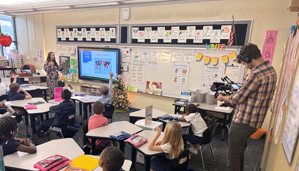 A camera man from GPB films Kari Apperson's class for a special on Gifted Learning