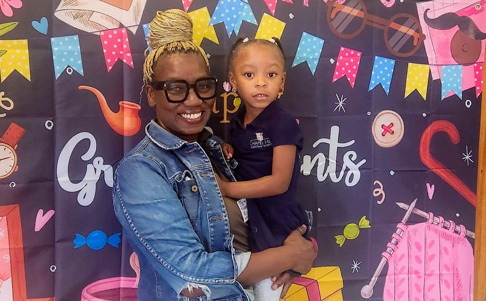 A MLES grandparent with her grandchild.