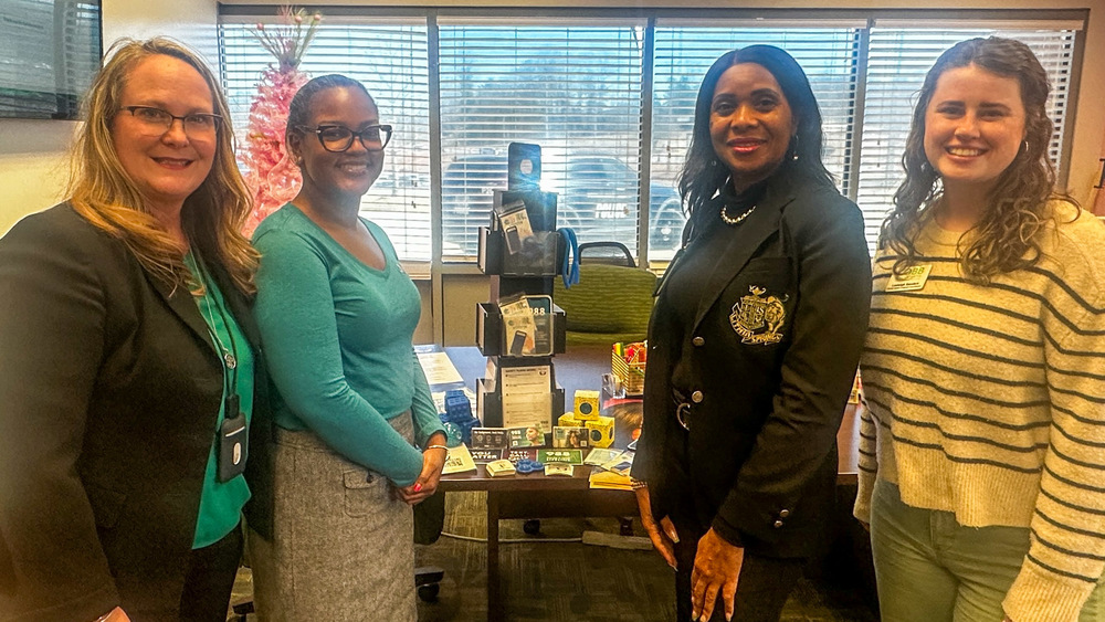 Communities in Schools Executive Director Mitzi Teal and Lithia Springs High Principal Felicia Jones take a group photo to feature the new Resiliency Stations in DCSS middle and high school counseling suites.
