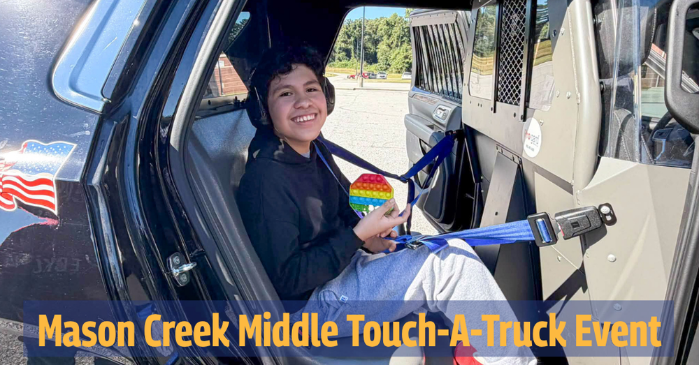 A MCMS student in a police vehicle with text "Mason Creek Middle Touch-A-Truck Event"