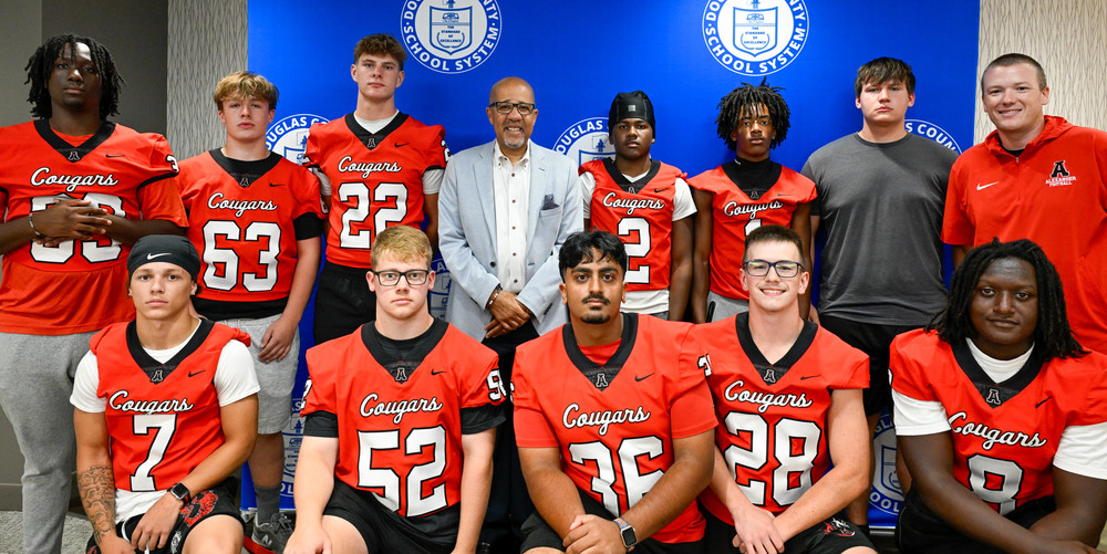 AHS football team with Dr. Trent North