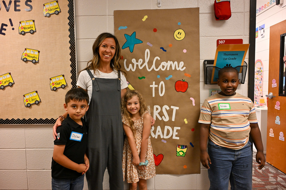 A Winston Elementary first grade teacher and students
