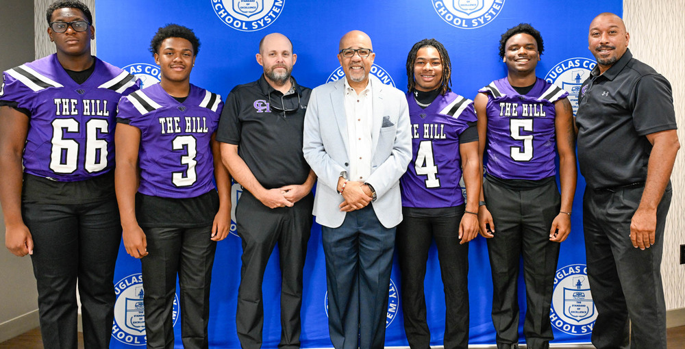 CHHS Football Team with Superintendent Dr. North