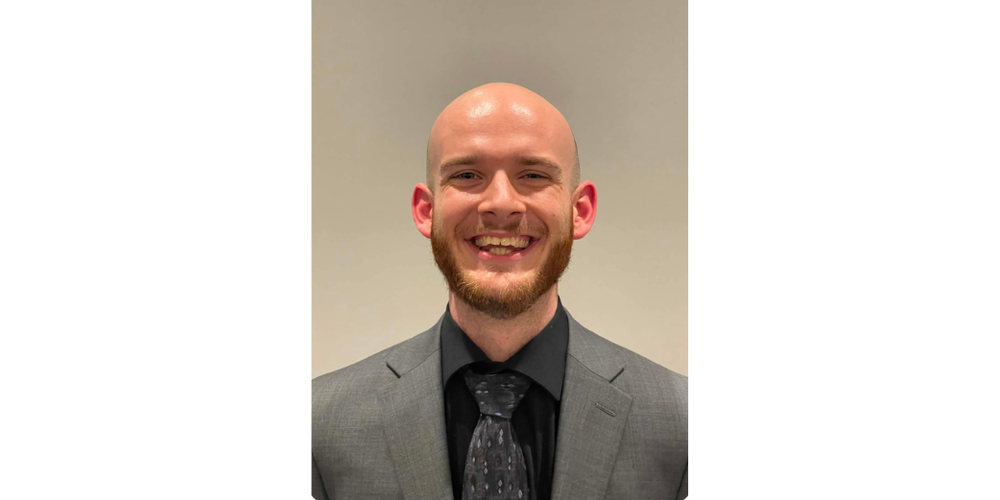 Head shot photo of Cameron Rice.