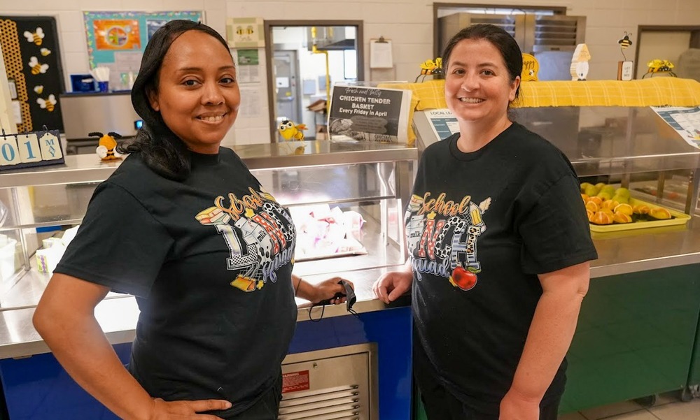 Two  School Nutrition employees  pose for a photo in the Beulah Elementary cafeteria.