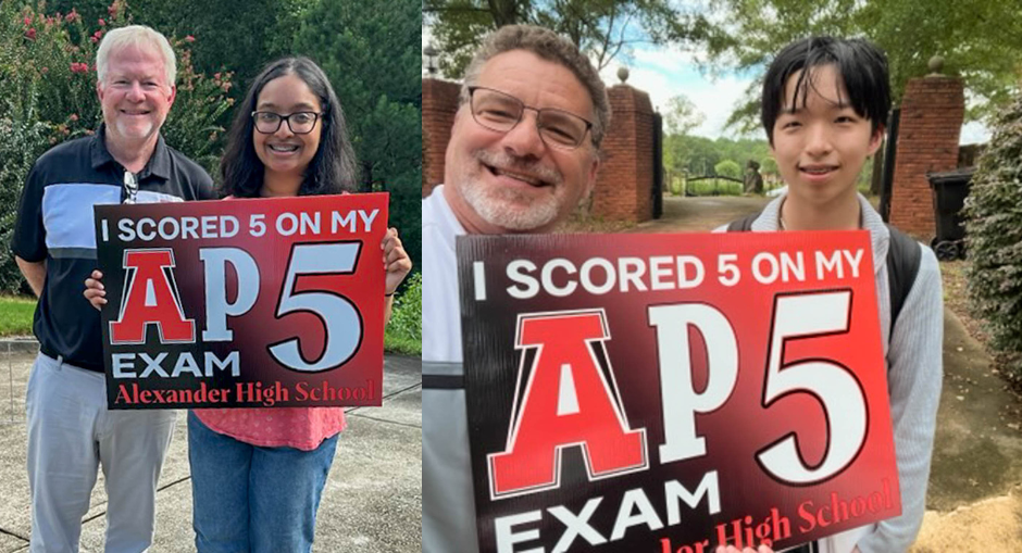 AHS students/admins with AP Top 5 Signs