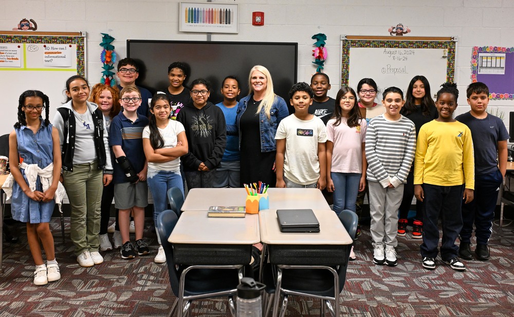 Winston Principal Heather George with students for the announcement that the school is a National Blue Ribbon School.