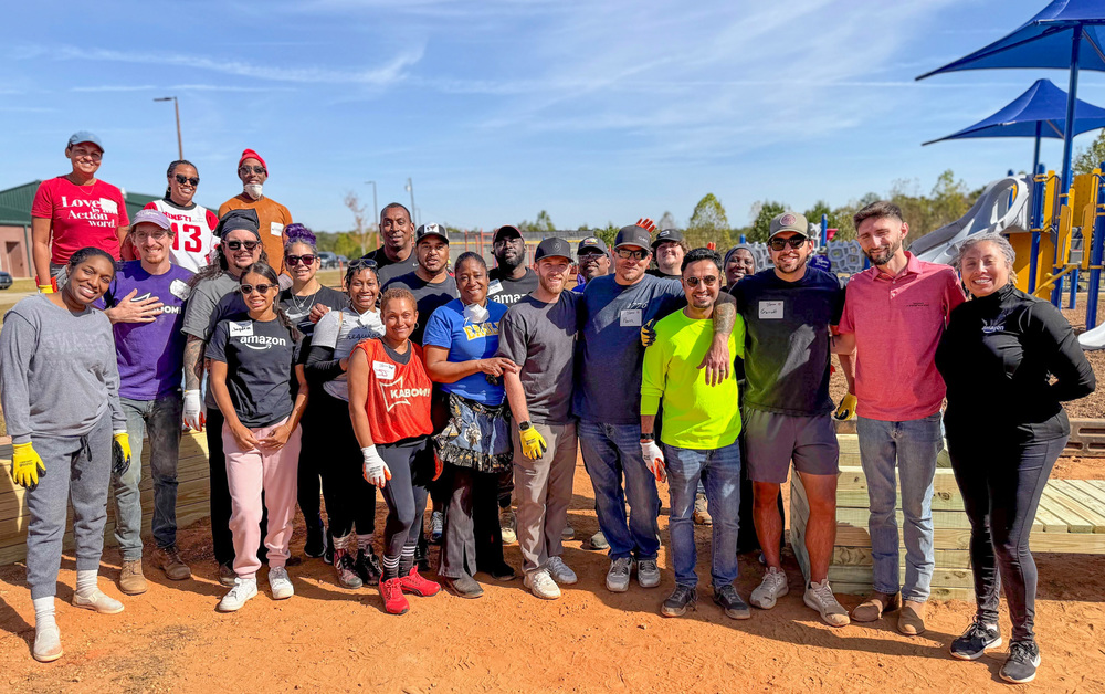 Staff and volunteers at the NEWS playground build.