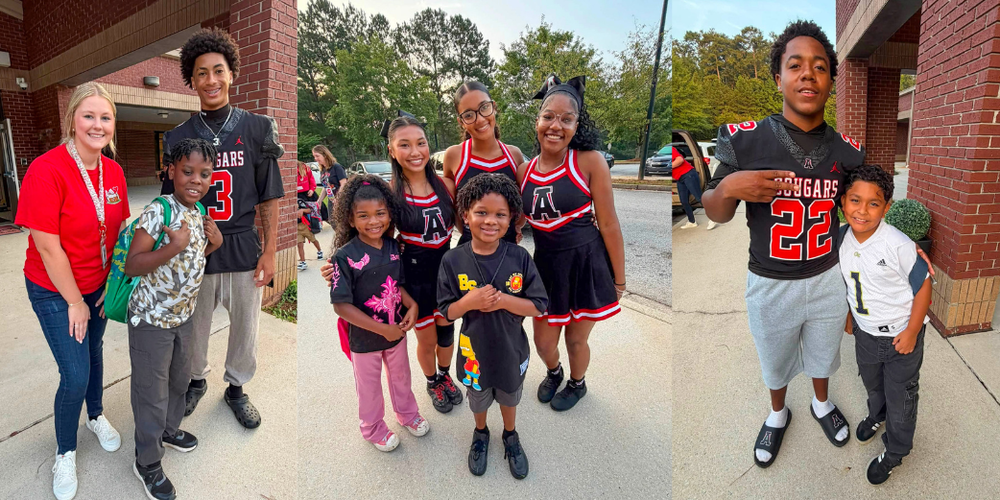 Alexander High football players and cheerleaders greet students at elementary feeder schools.