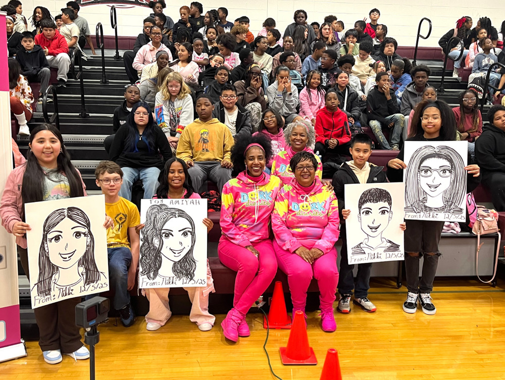 Chestnut Log Middle School recently welcomed No. 1 New York Times bestselling author Rachel Renee Russel and illustrator Nikki Russell.  The authors are pictured with students and staff in the gym.
