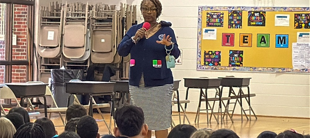 LSES principal Tonia Small speaks to students during a GMAS Pep Rally.