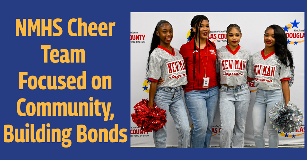 New Manchester High School cheerleaders and their coach stand arm in arm in front of a Douglas County School System backdrop. Three wear silver “Newman Jaguars” jerseys, and two hold red and silver pom-poms. Text reads: “NMHS Cheer Team Focused on Community, Building Bonds.”