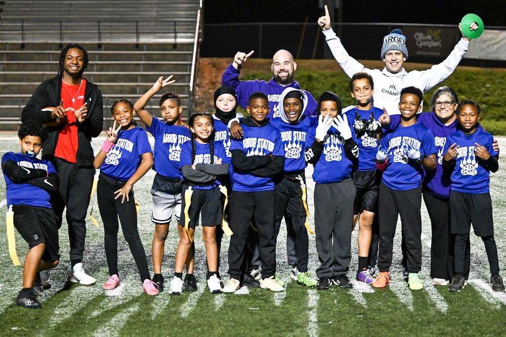 ASES flag football team photo after Turkey Bowl win.