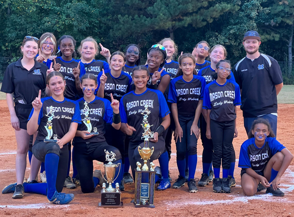 Mason Creek softball team with county championship trophies.