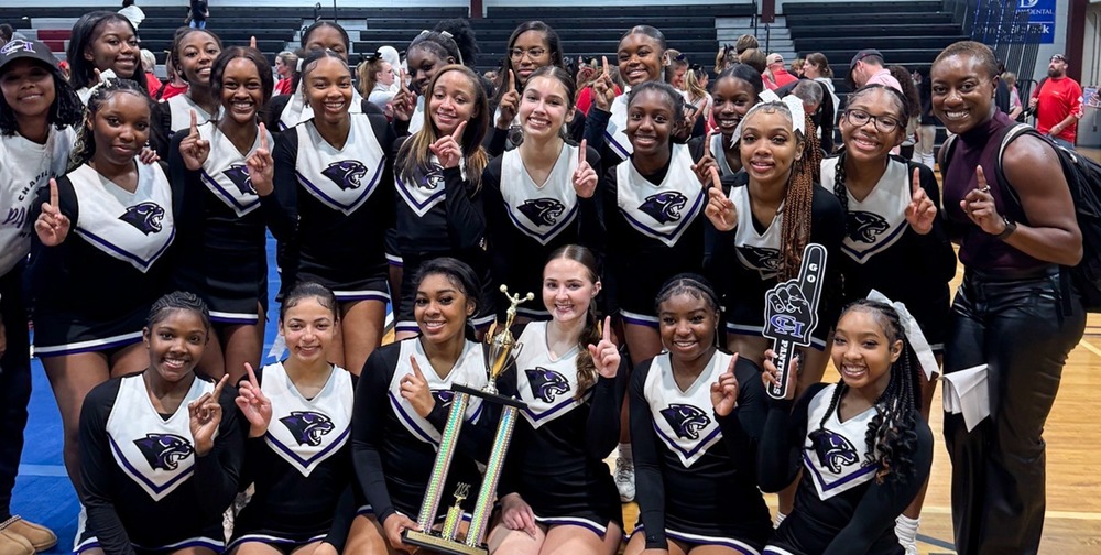 CHHS cheer team with trophy