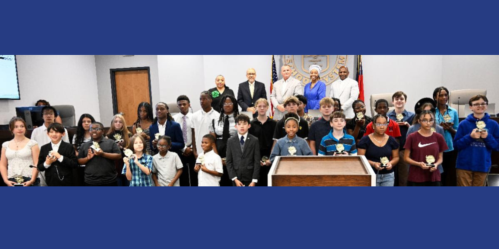 Group photo of the 47 perfect GMAS students with the Board of Education.
