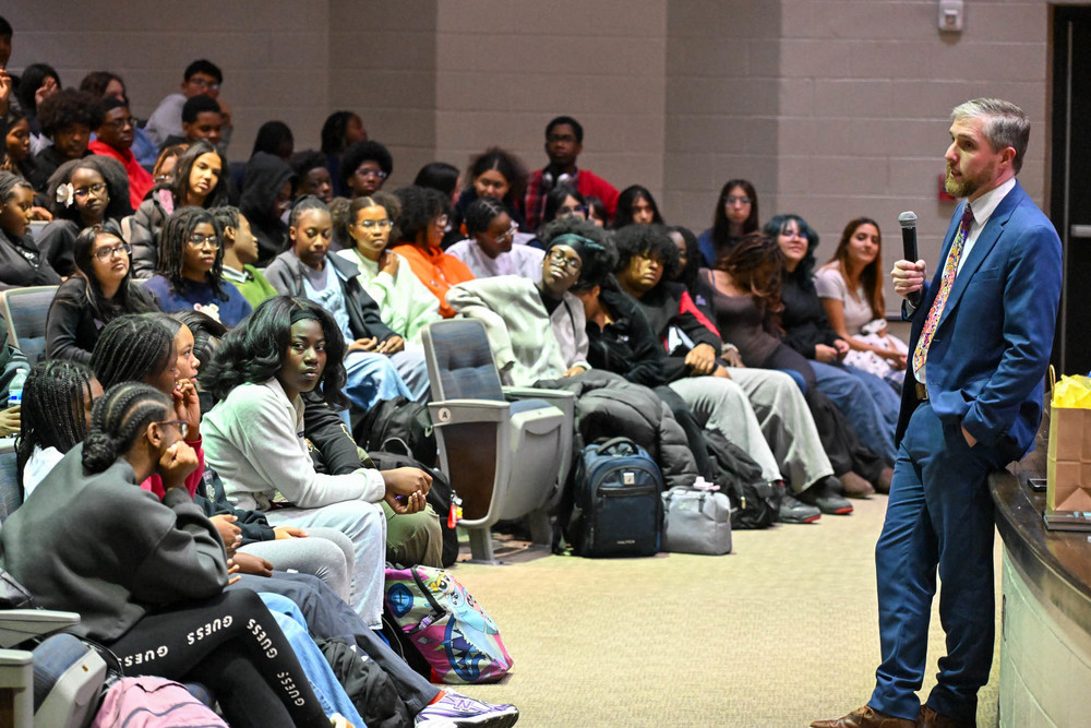 Diplomat Chaz Lott speaks to IB students at DCHS.