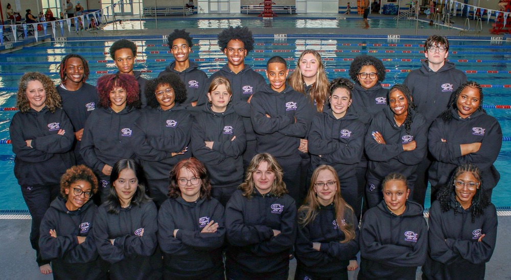 Chapel Hill High swim team group photo at pool.