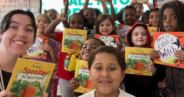 Students in Sarah Bruce's class with their books