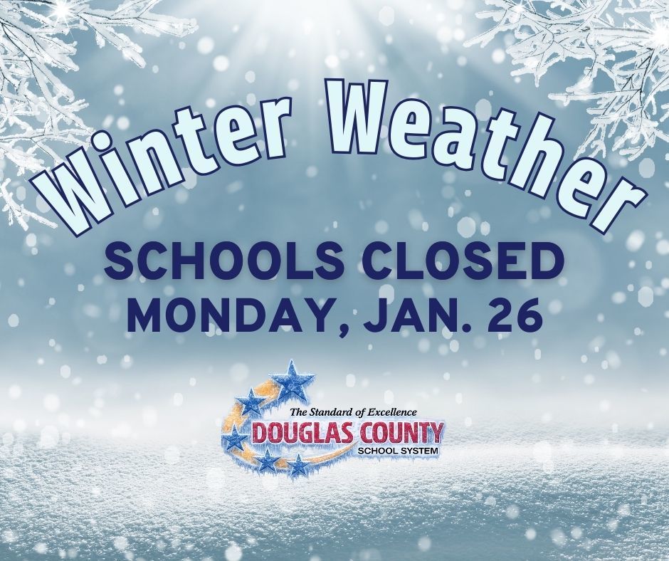 Douglas County School System winter weather graphic announcing schools closed Monday, Jan. 26, with snowflakes and icy branches in background and district logo.