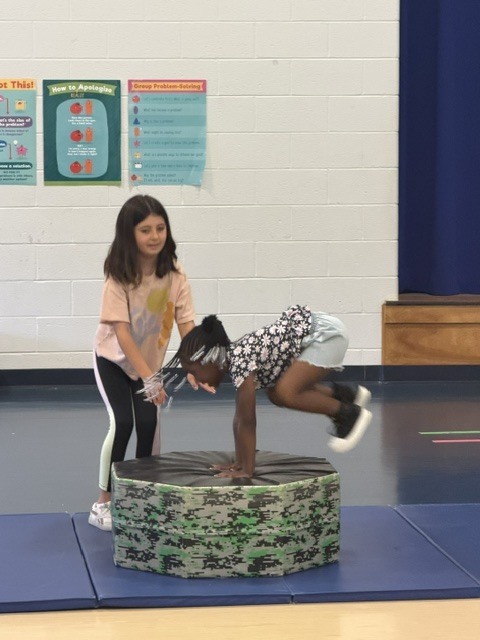 Douglasville Gymnastics Showing skills in PE
